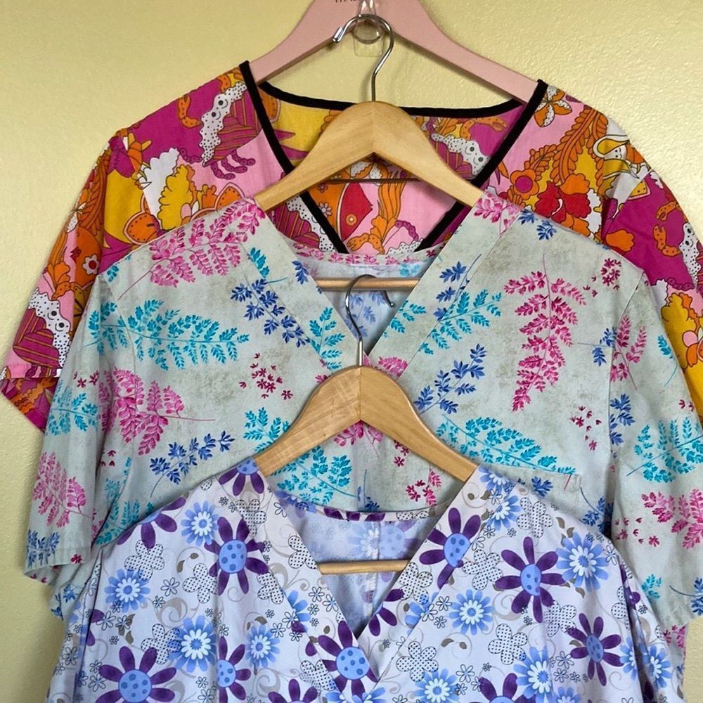 $9.  3 Scrubs Tops Size 1X